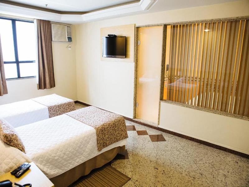 elegance-praia-hotel-rio-de-janeiro-suíte-com-banheira-de-hidromassagem-02034.jpg